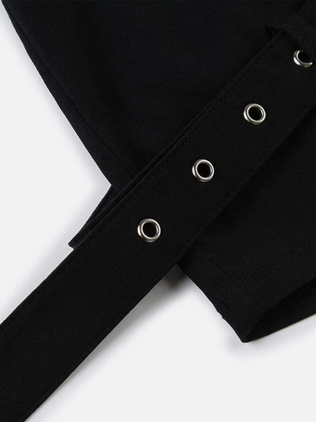 Detailed fabric and belt design of TALISHKO's black eyelet shorts, perfect for stylish outfits.