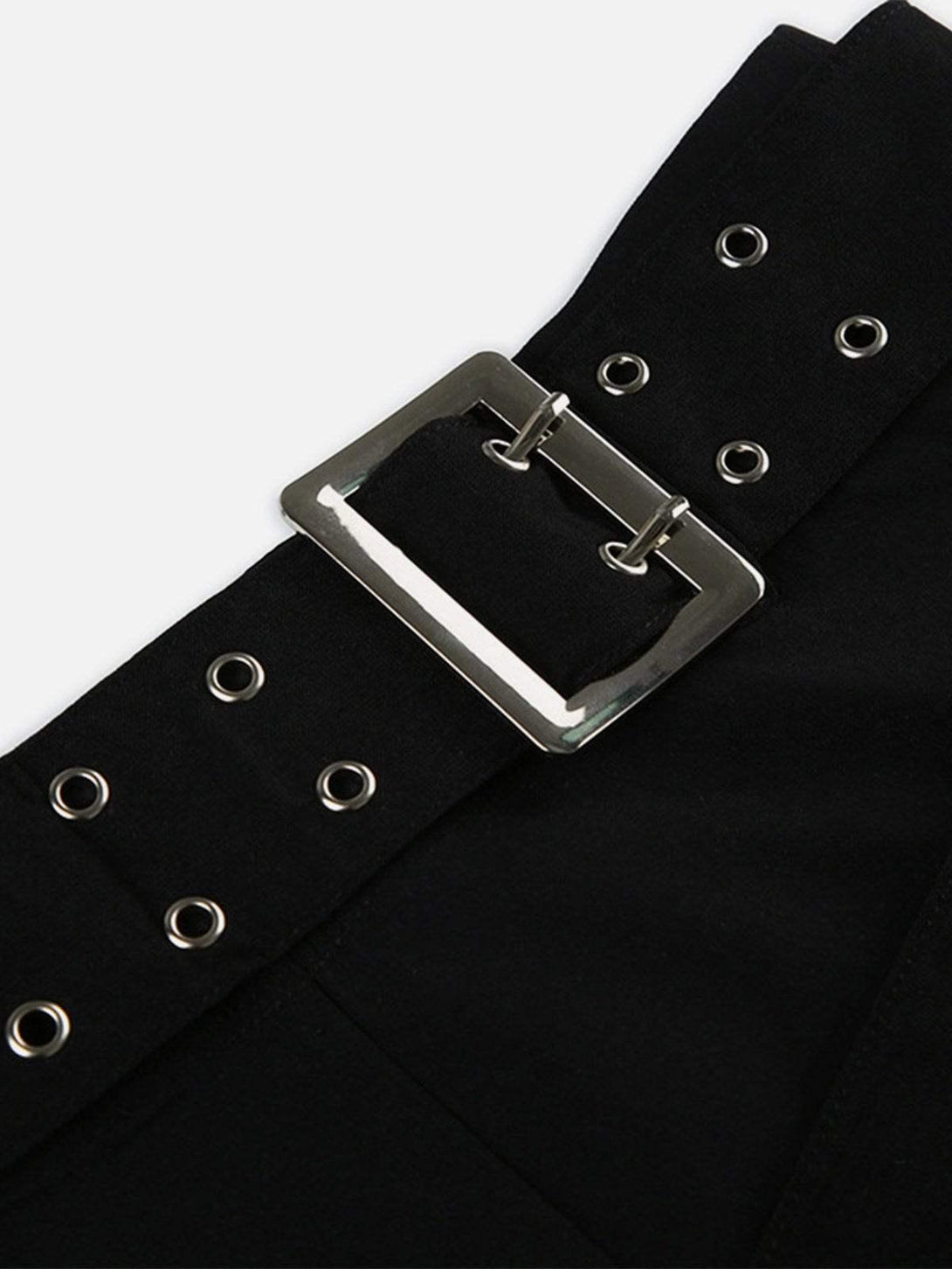 Intricate look at TALISHKO's black eyelet shorts, featuring a stylish belt detail.