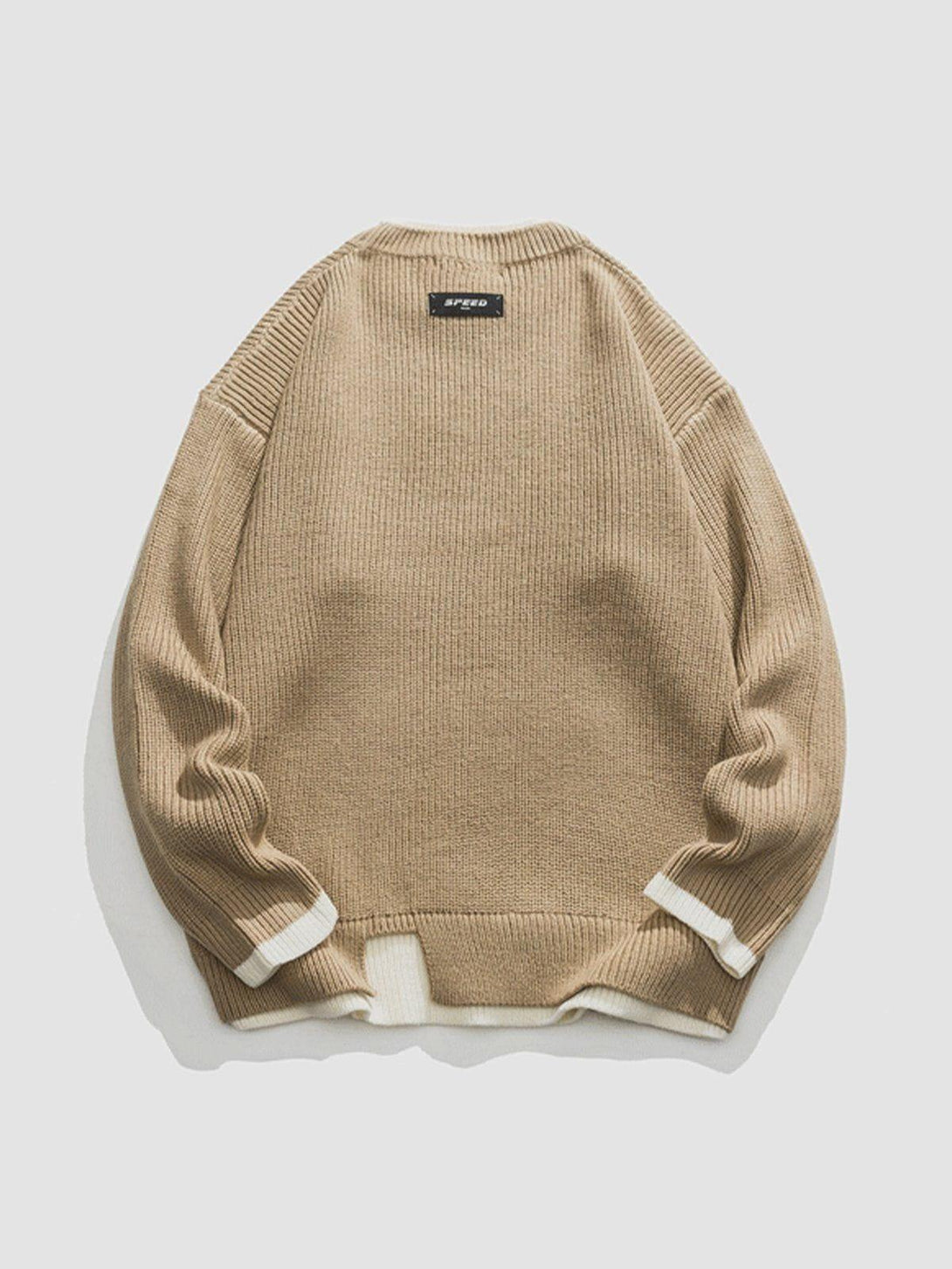 Back view of TALISHKO's khaki patchwork knit sweater, featuring ribbed detailing and white trim.