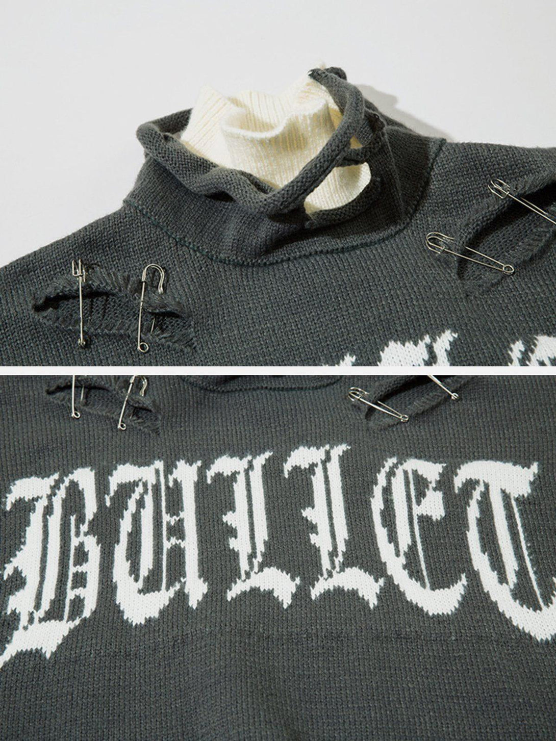 A detailed view of the TALISHKO sweater featuring bold text and unique pin design for an edgy look.