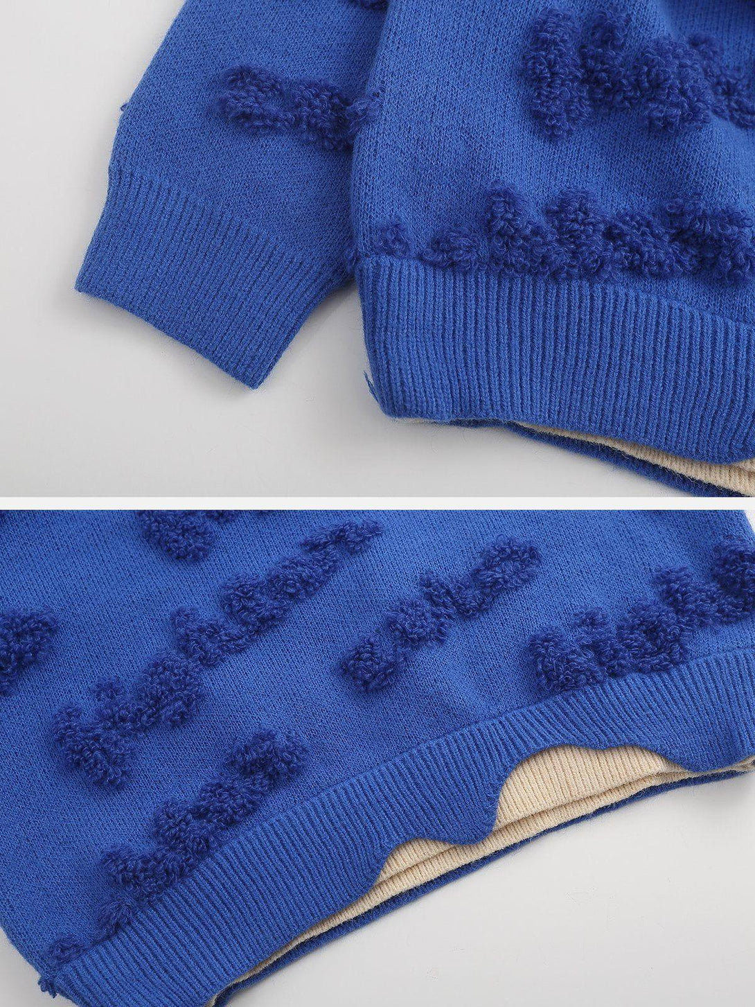 A close-up of TALISHKO's blue fake two sweater, showcasing textured knit details and ribbed cuffs.