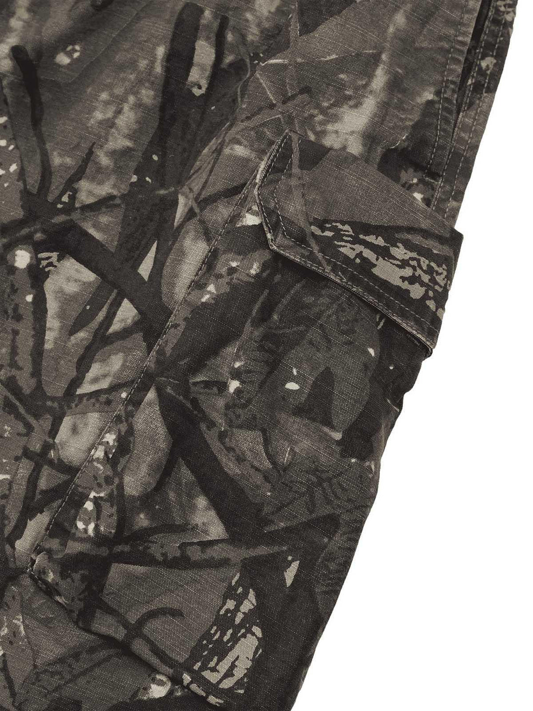 Intricate look at TALISHKO shorts, highlighting the detailed camouflage pattern and pocket.