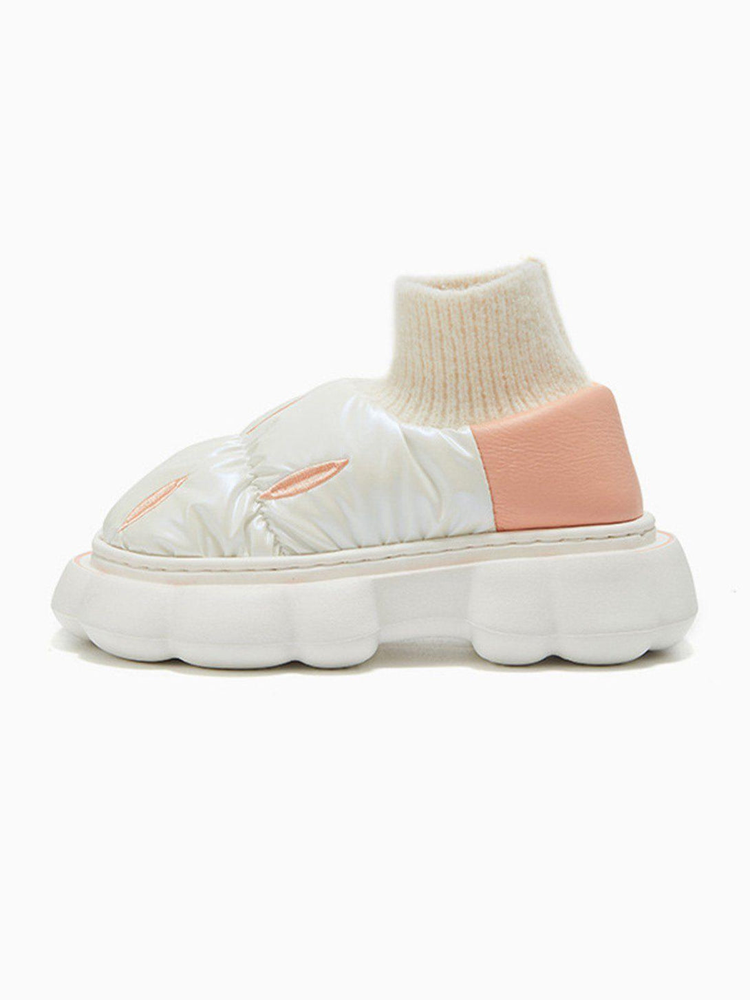 Side view of TALISHKO's latex cotton-padded shoes with knit cuffs and a plush, unique sole design.