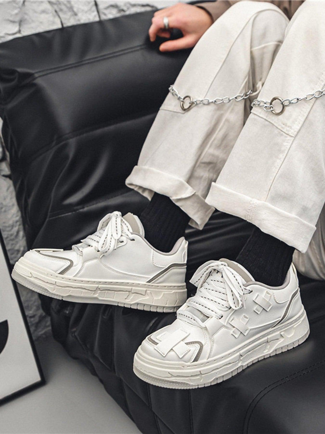 Model wearing TALISHKO white thick-soled board shoes, paired with casual pants and black socks.