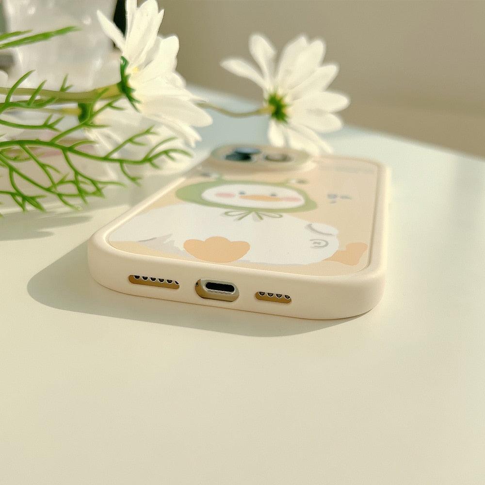 A charming duck iPhone case by TALISHKO, featuring a cute design on a light-colored background.