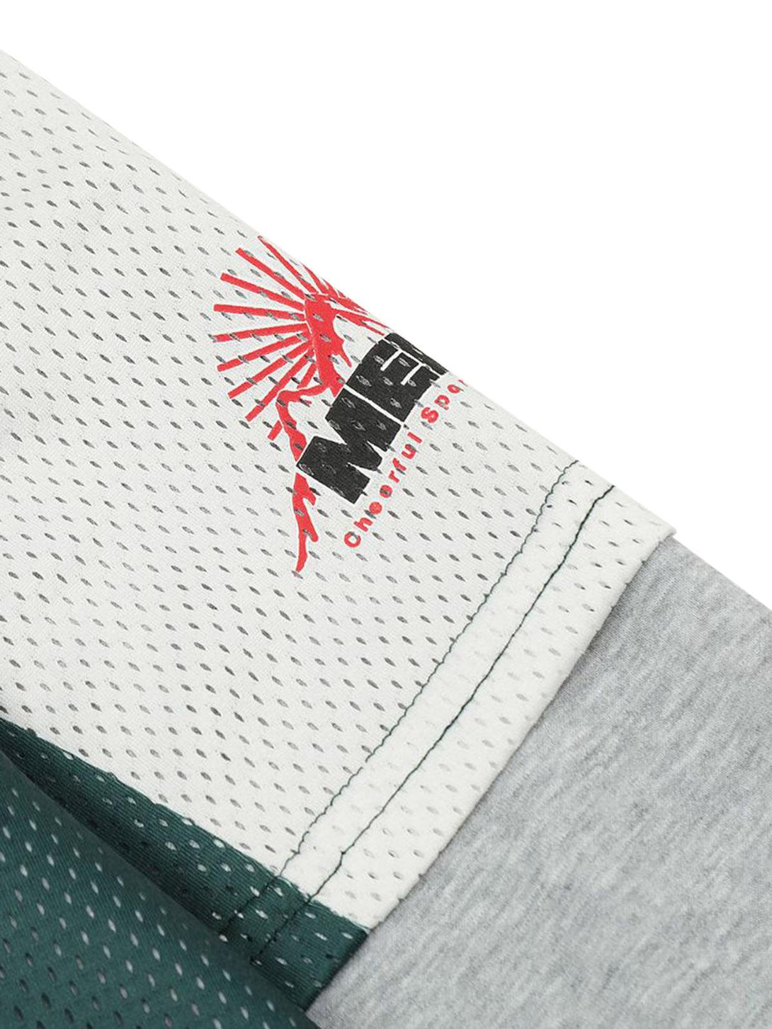 Detailed fabric and stitching on TALISHKO hoodie, highlighting contrast color and graphic design.