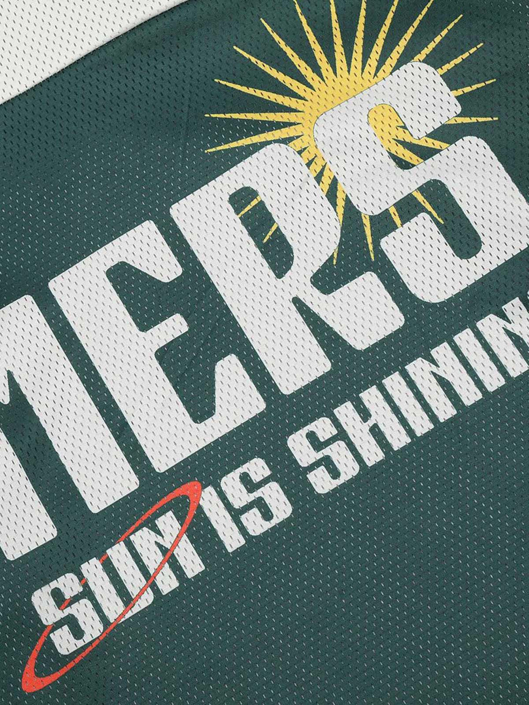 Bold text and sun graphic detail on TALISHKO hoodie, emphasizing contrast stitching.