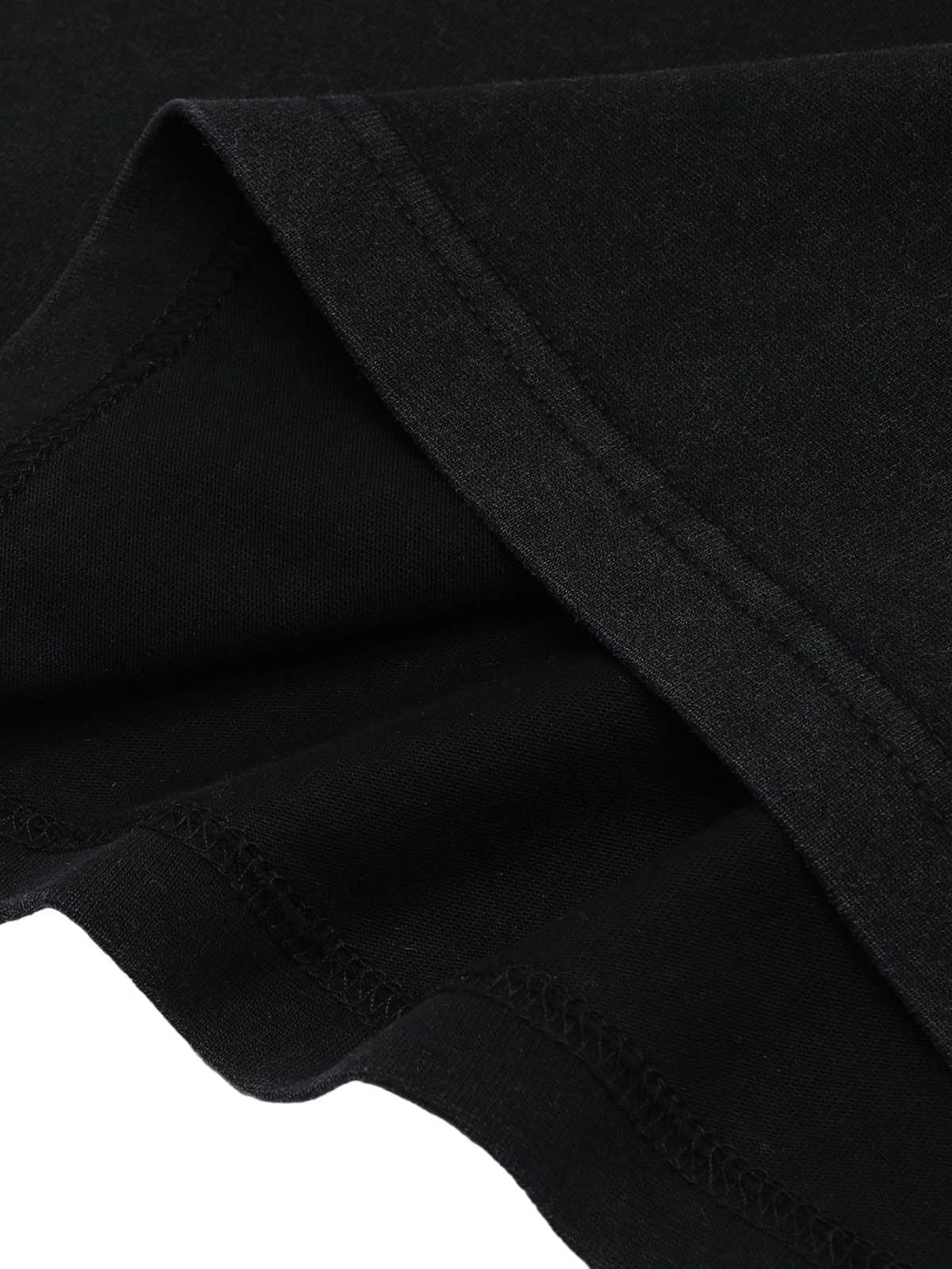 Detailed fabric and stitching on a black oversized T-shirt sleeve by TALISHKO.