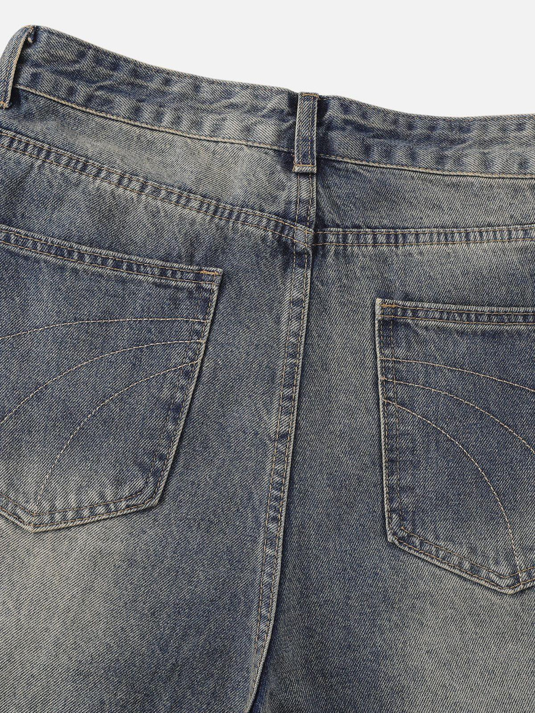 TALISHKO firework beadwork loose jeans, back view highlighting pocket stitching and faded wash.