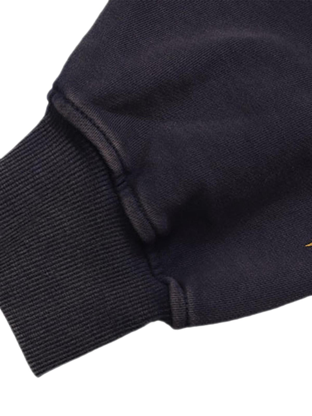 Ribbed cuff detail on TALISHKO hoodie, showcasing texture and quality craftsmanship.