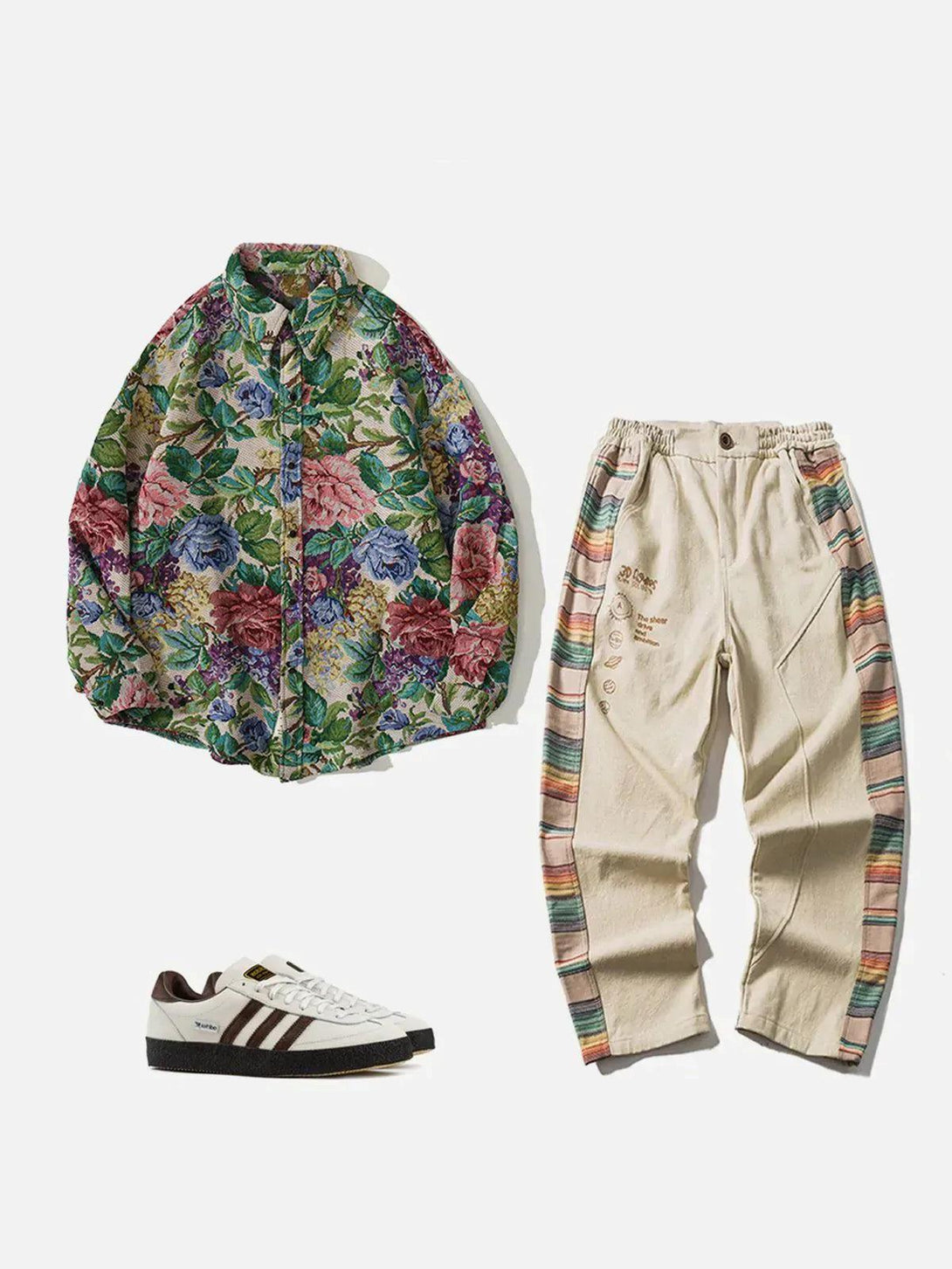 Floral embroidered shirt by TALISHKO with beige pants and sneakers, showcasing vibrant style.