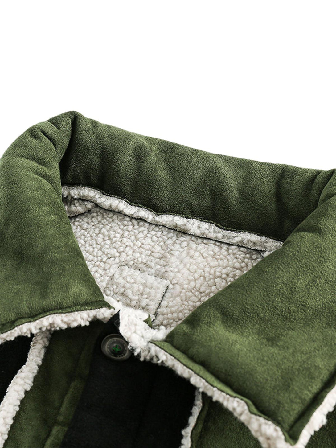 A close-up of the green suede fleece jacket by TALISHKO, highlighting its cozy interior lining.