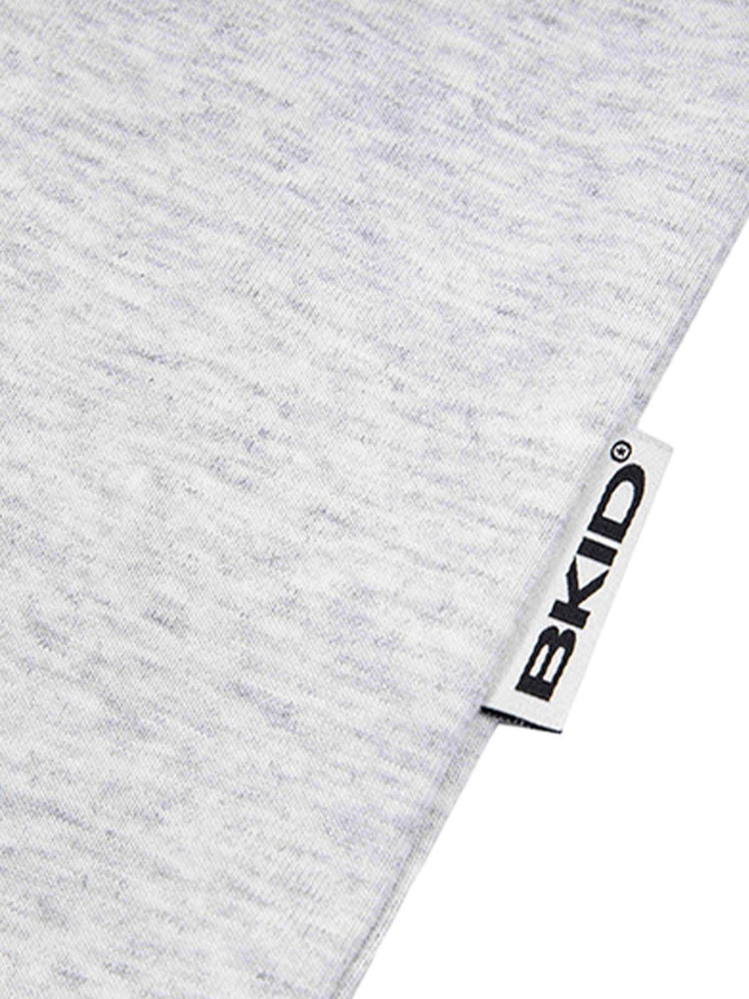 Zoomed-in texture of TALISHKO light gray T-shirt, highlighting quality fabric and subtle design.