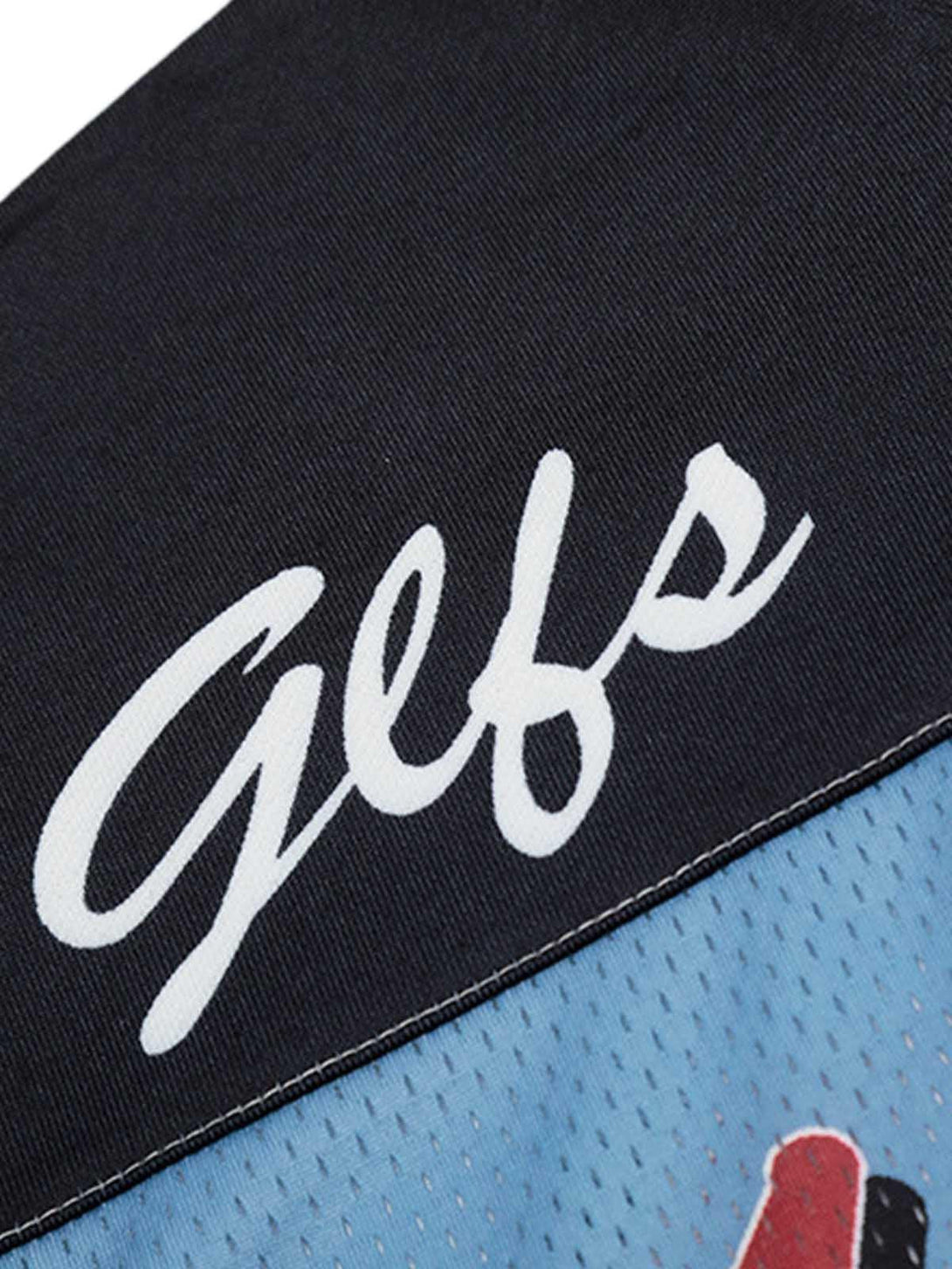 A close-up of TALISHKO's jersey, highlighting the script detail on the black and blue fabric.