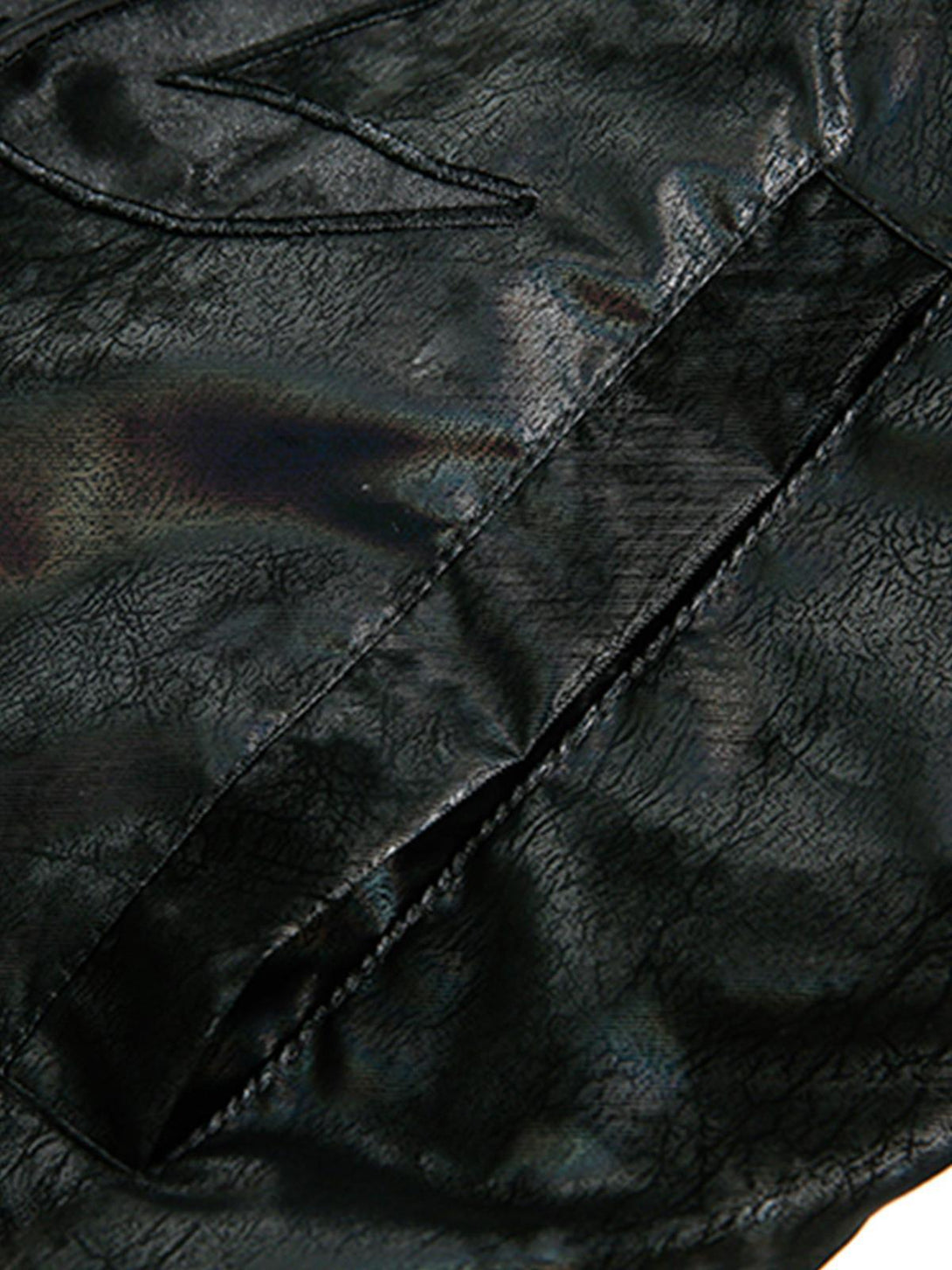Detailed fabric and stitching on TALISHKO leather jacket, highlighting sleek craftsmanship.