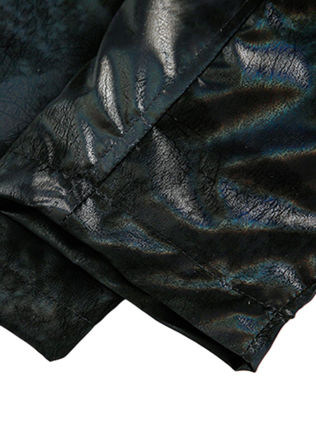 Texture and pattern showcased on TALISHKO leather jacket, highlighting its glossy sheen.