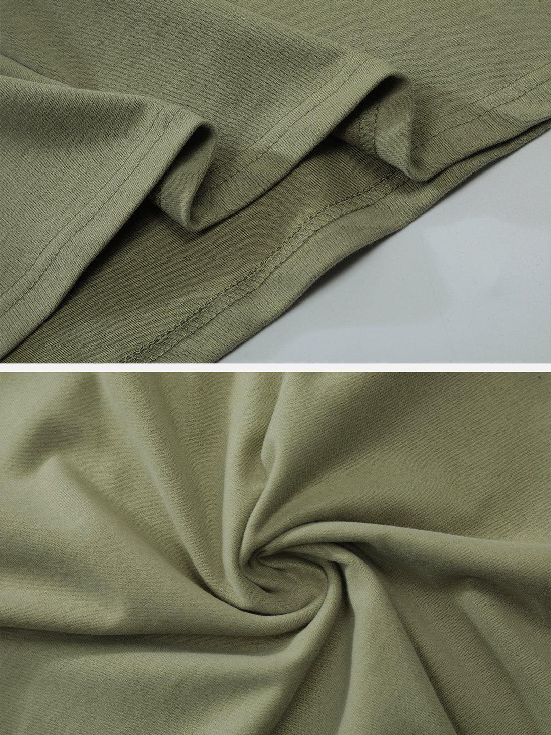 Detailed fabric and stitching of green TALISHKO tee, highlighting its soft texture and quality.