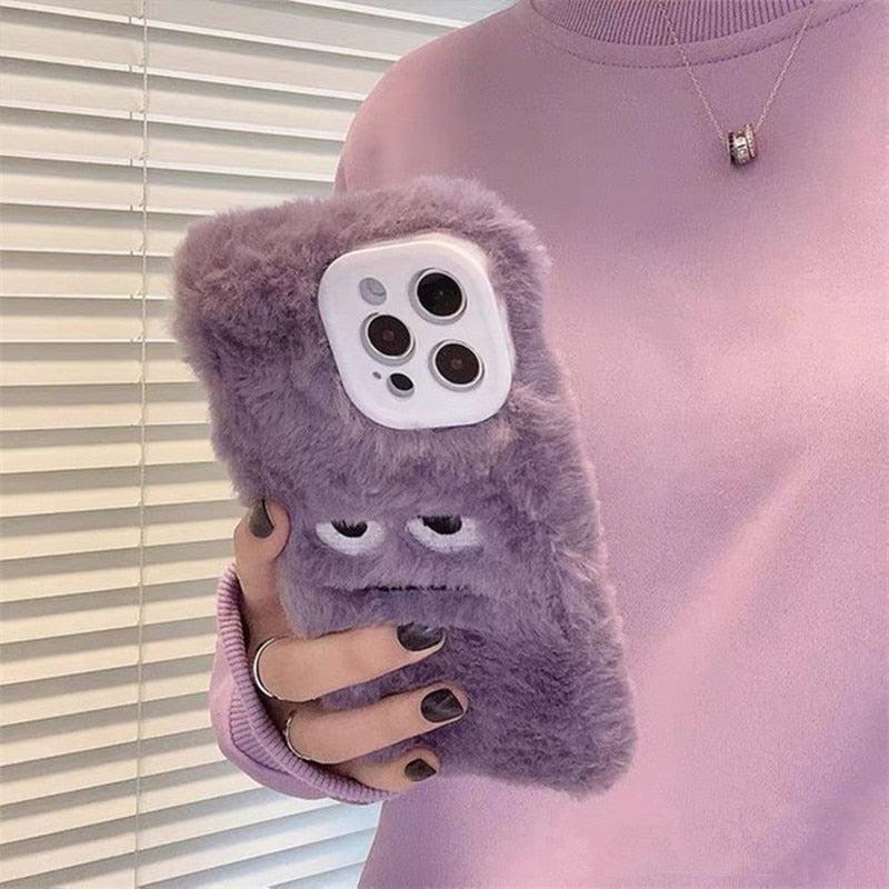 TALISHKO's plush monster phone case adds a fun touch with its unique design for iPhone users.