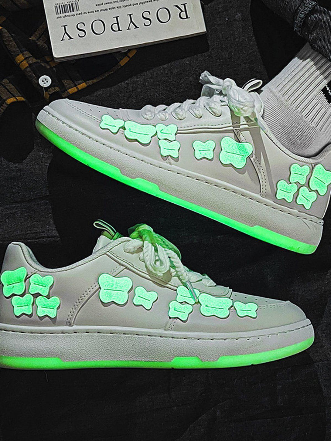 TALISHKO skate shoes with glowing butterfly accents, showcasing a vibrant and playful design.