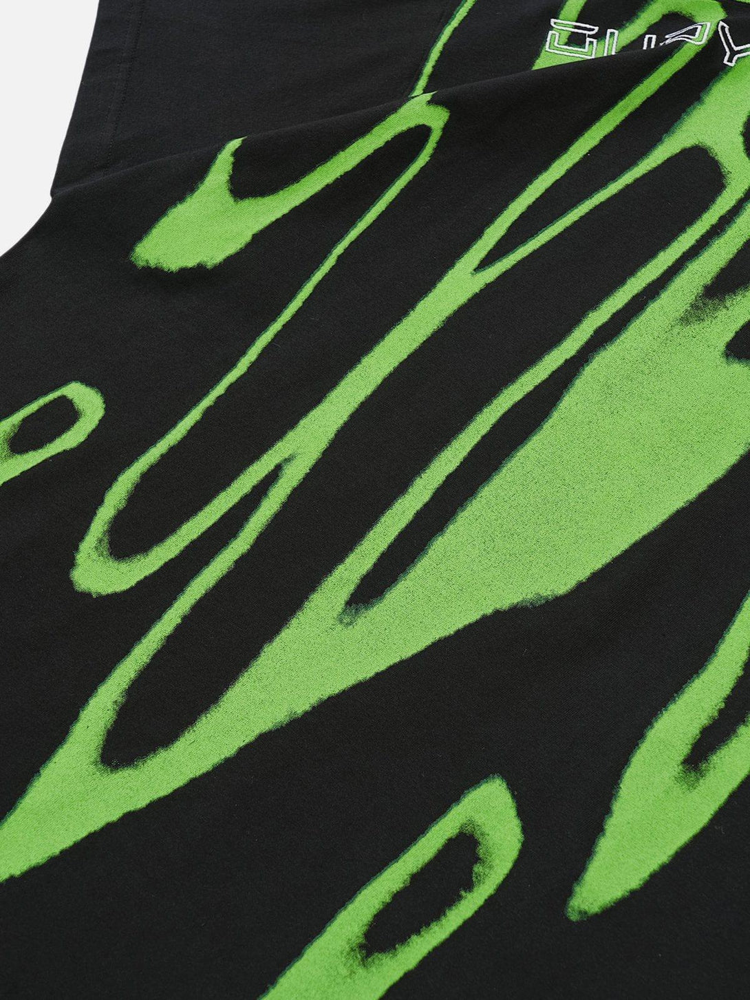 Vibrant green abstract pattern on a black tee by TALISHKO, showcasing bold summer style.