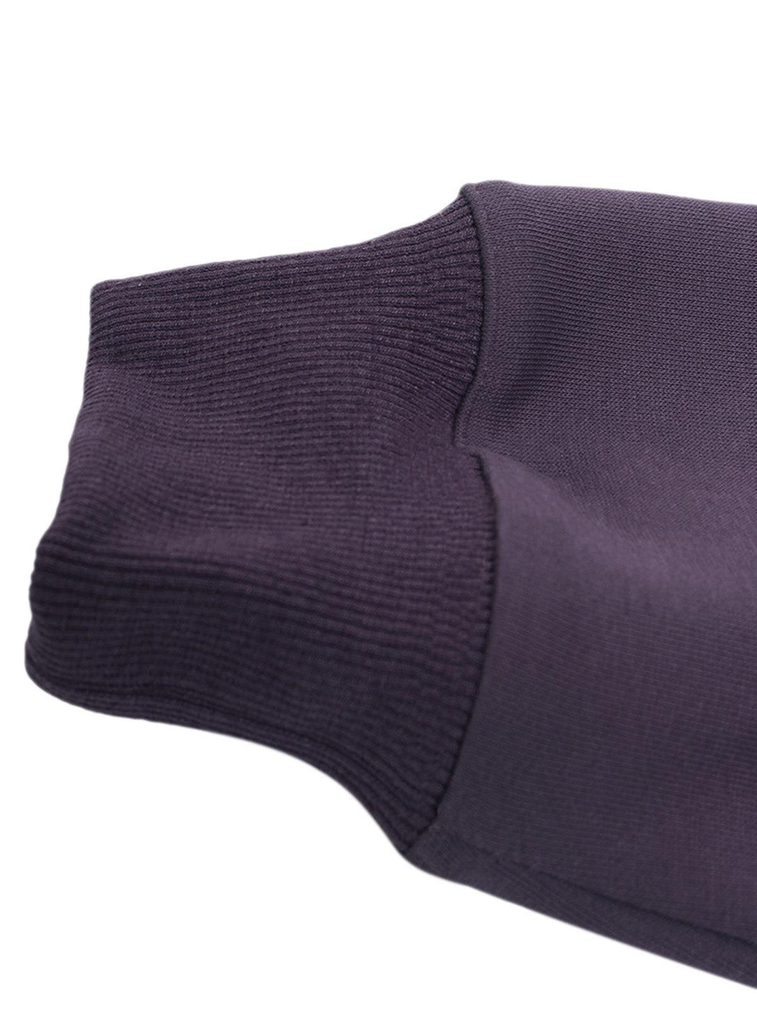 Detailed view of the ribbed cuff on a TALISHKO hoodie, highlighting its texture and craftsmanship.