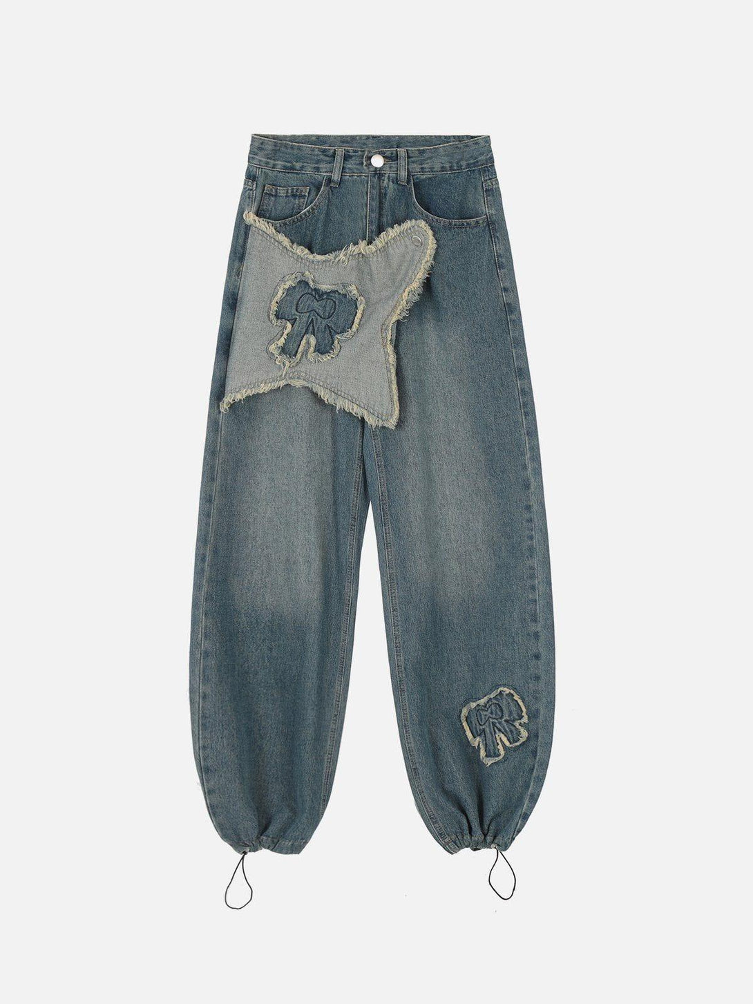 Front view of TALISHKO fringe bow jeans with distinctive patchwork and adjustable hem.