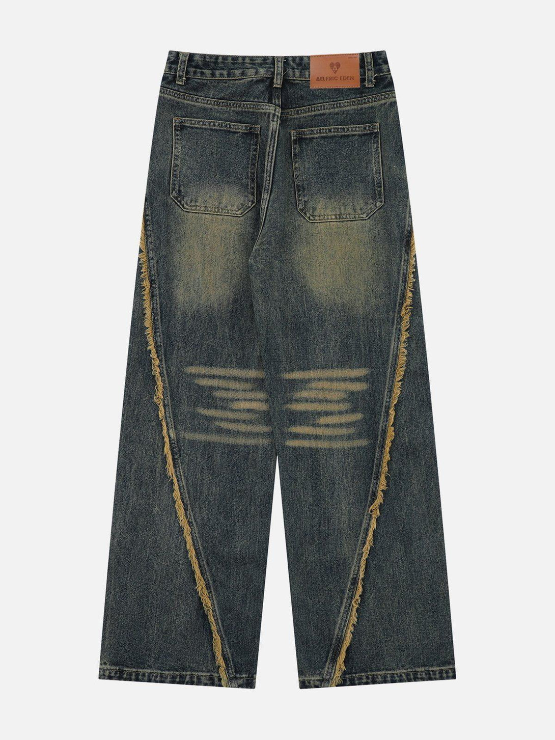 Back view of TALISHKO fringe washed jeans, highlighting distressed texture and unique fringe details.