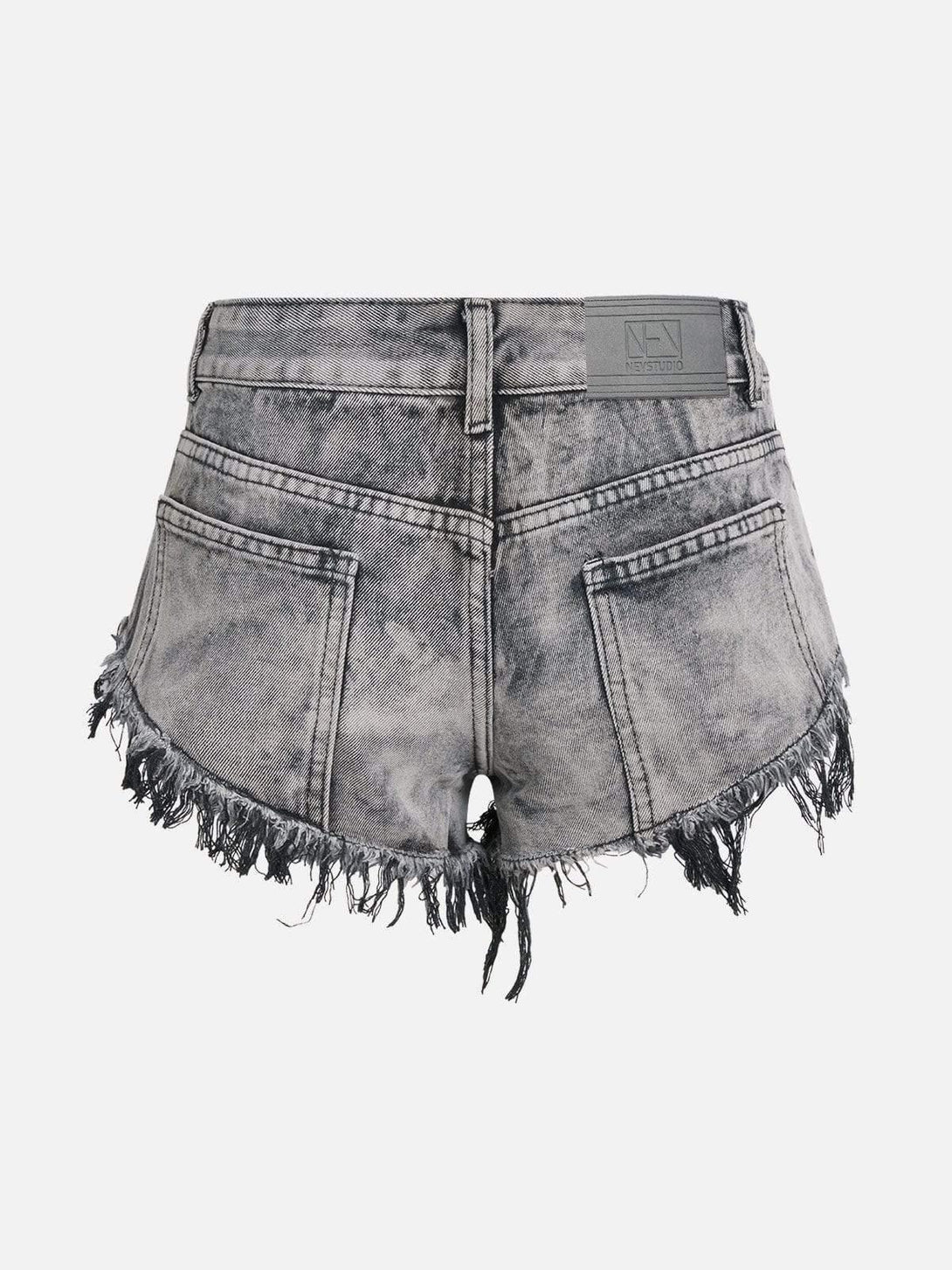 Back view of gray fringe washed shorts by TALISHKO, highlighting a trendy, distressed look.