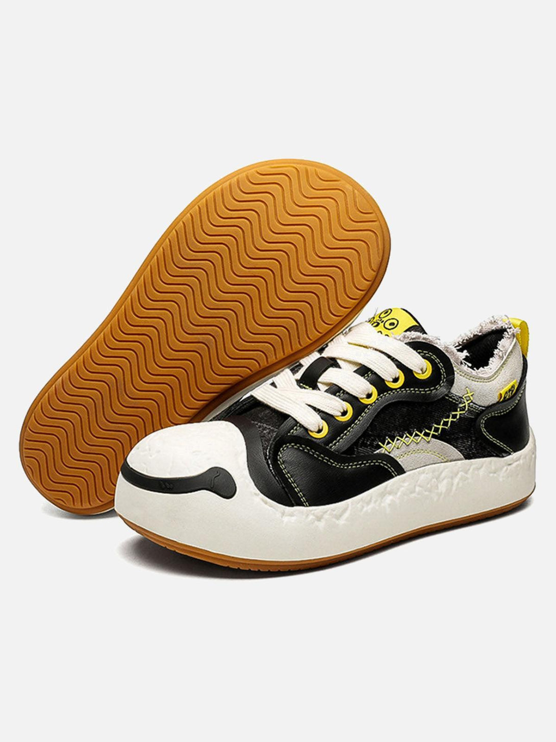 TALISHKO sneakers with a bold design, highlighting leather splicing and vibrant sole detail.