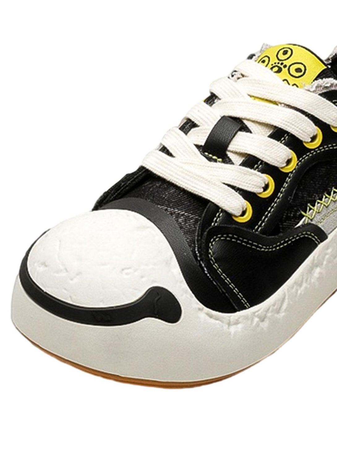TALISHKO sneakers with a fun design, highlighting leather splicing and unique toe details.