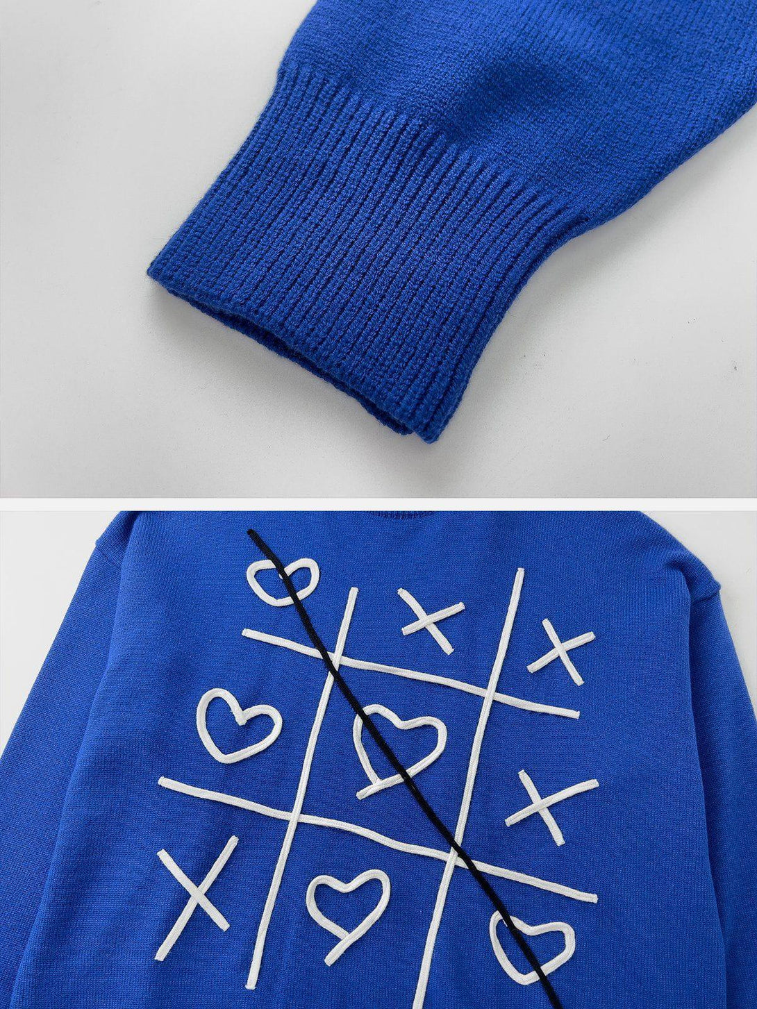 Detailed look at the blue sweater sleeve and tic-tac-toe design by TALISHKO.