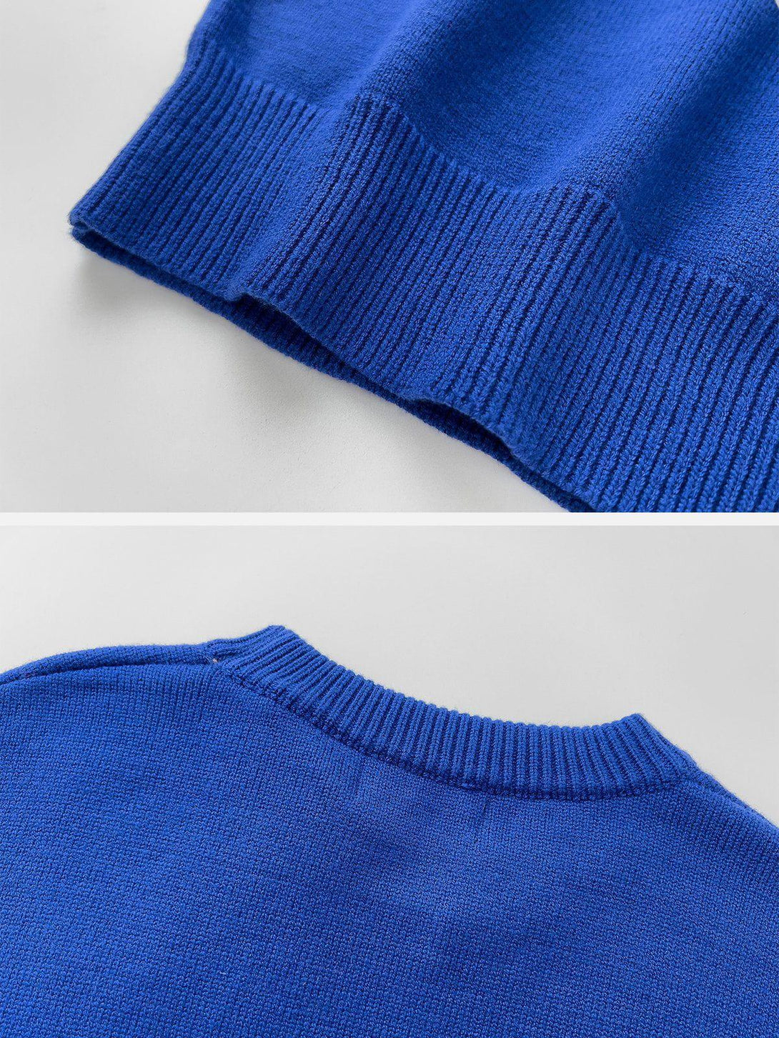 Ribbed hem and neckline details of a blue sweater by TALISHKO, highlighting quality craftsmanship.