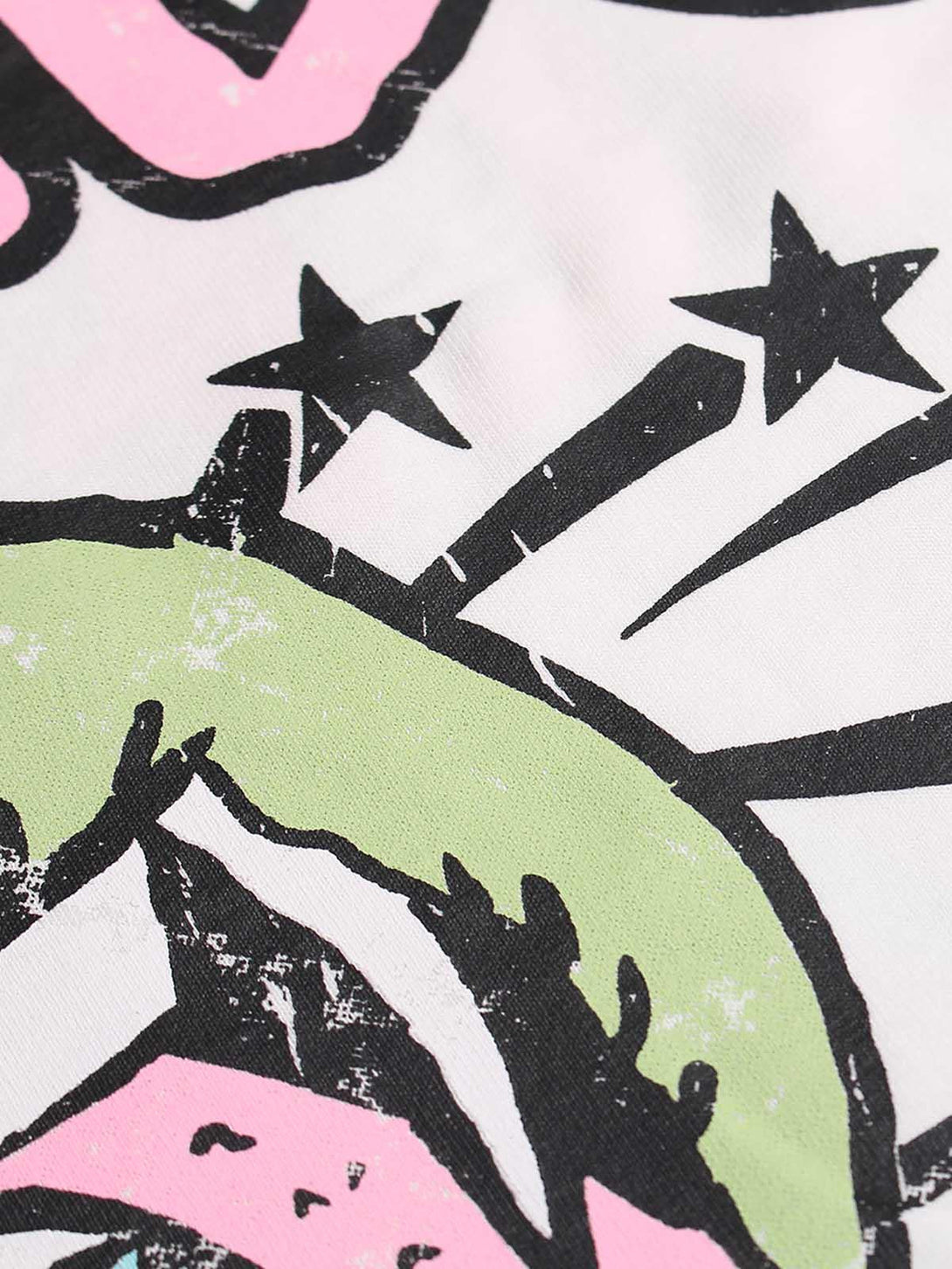 Intricate look at TALISHKO's fun graphic print T-shirt with vibrant colors and playful design.