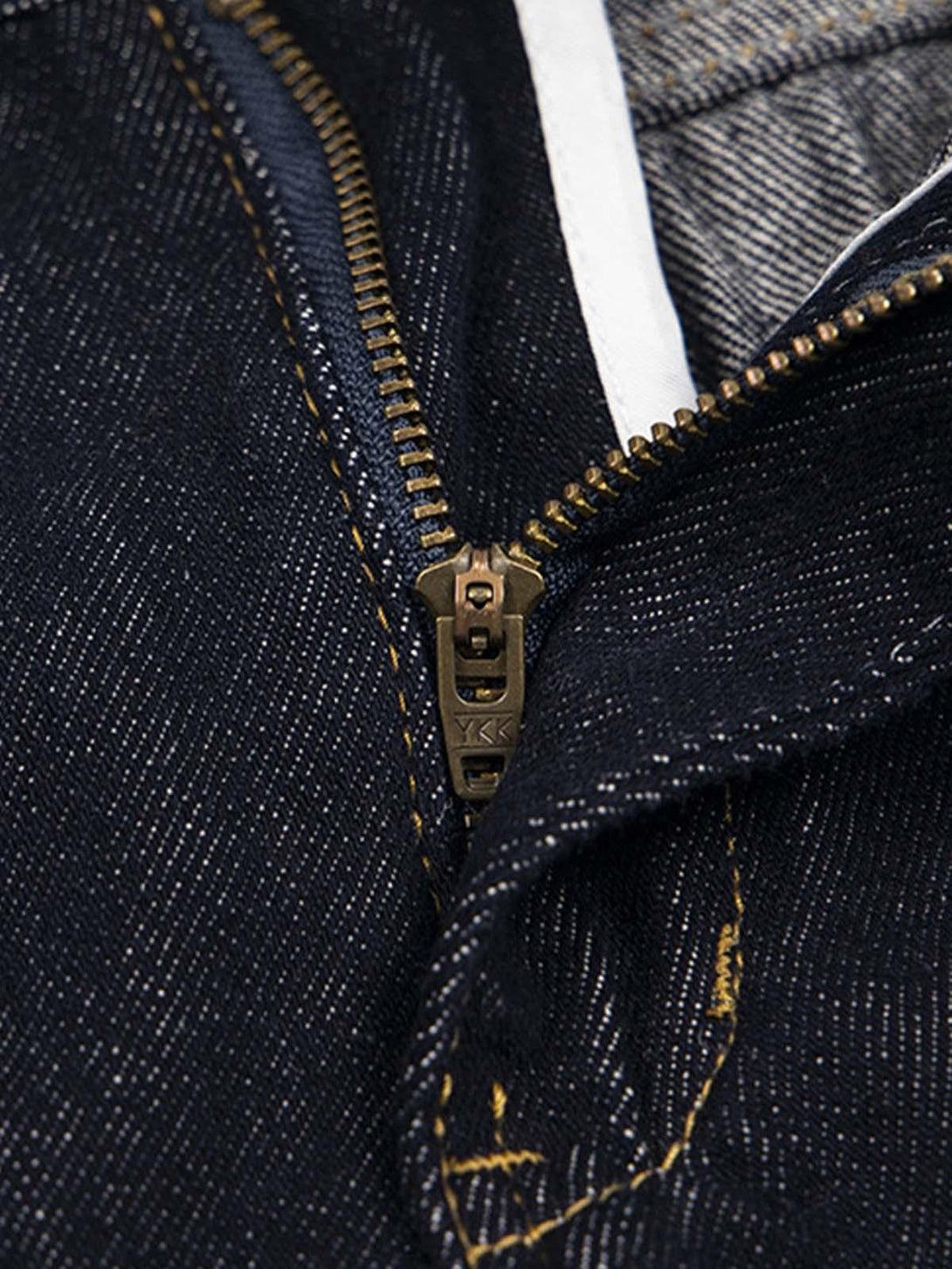Intricate look at TALISHKO jeans zipper, highlighting detailed stitching and denim texture.