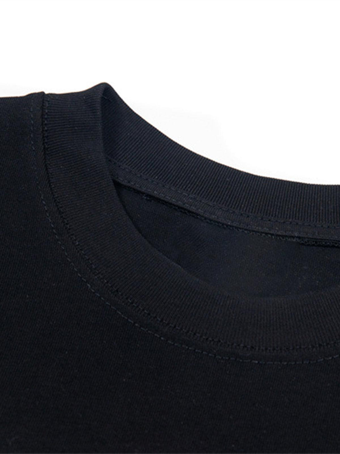 A detailed view of a black T-shirt neckline by TALISHKO, showcasing quality stitching.