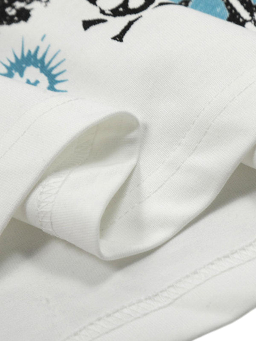 Detailed fabric and stitching on a TALISHKO fun portrait graphic T-shirt, capturing unique style.