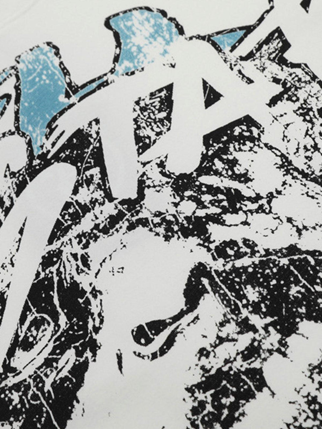 Zoomed-in shot of TALISHKO graphic T-shirt highlighting bold black and white portrait details.