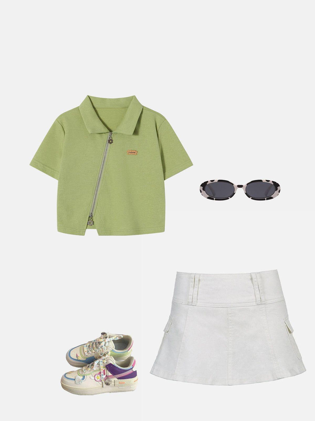 TALISHKO's green zip-up crop tee paired with a white skirt, colorful sneakers, and chic sunglasses.