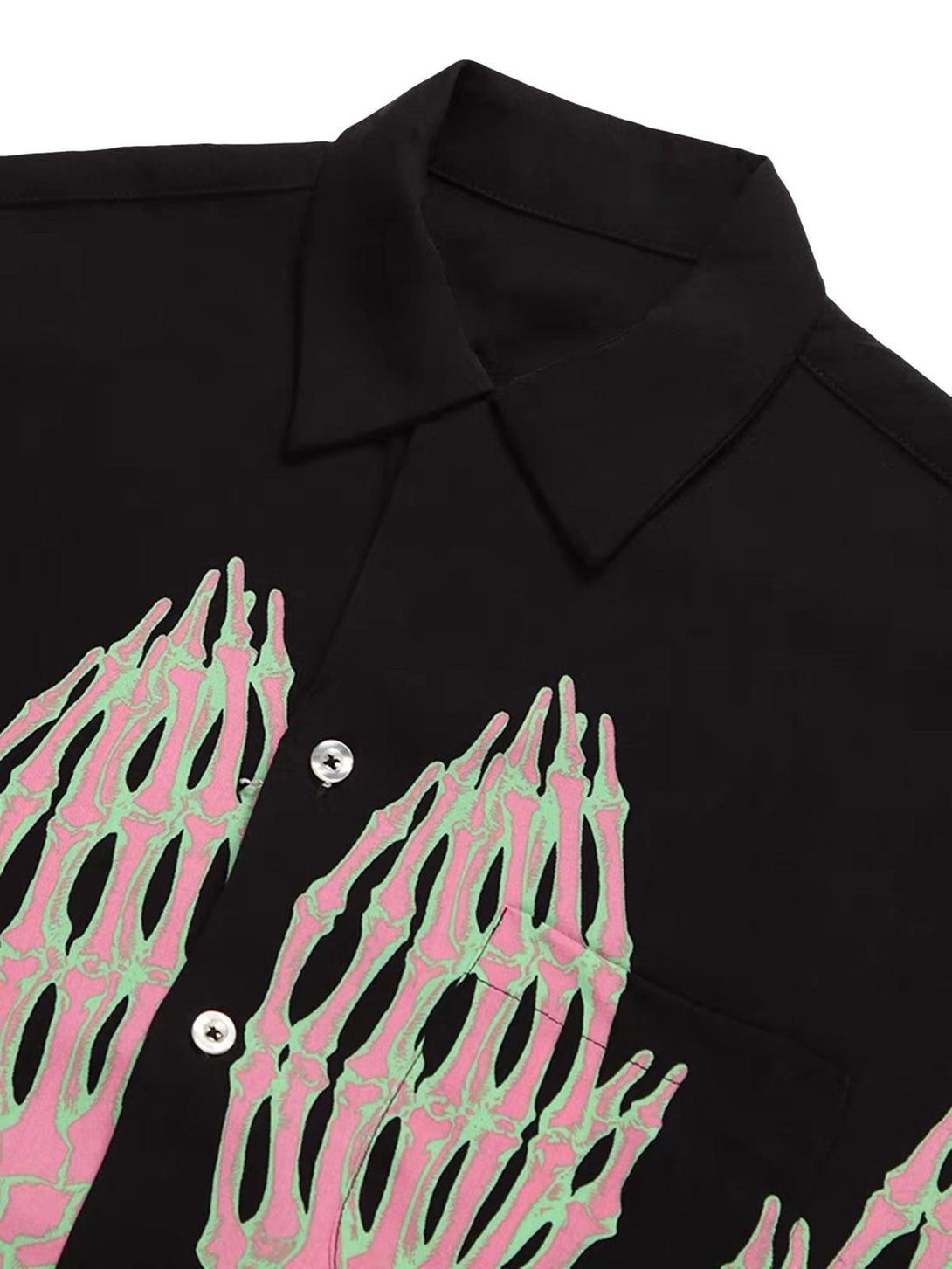 TALISHKO shirt detail showing pink and green ghost claw pattern on black fabric.