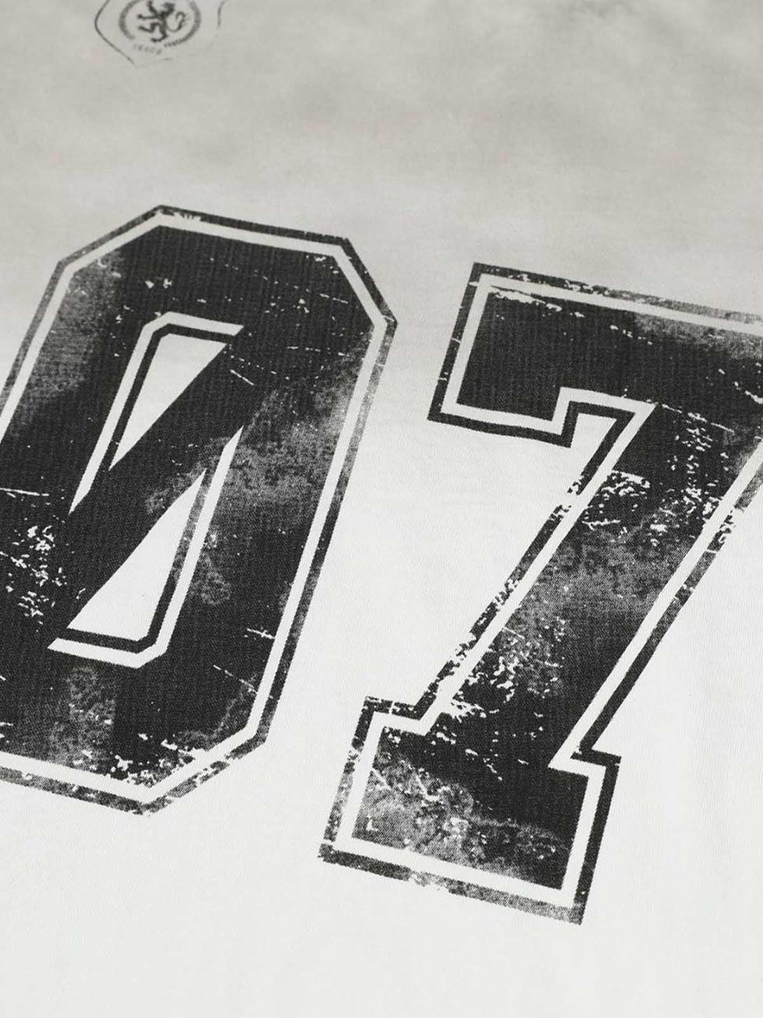 A detailed look at the TALISHKO jersey t-shirt featuring a bold "07" graphic design.