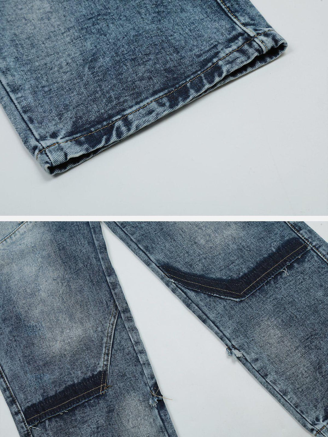 A detailed view of TALISHKO gradient jeans, focusing on the intricate stitching and texture.