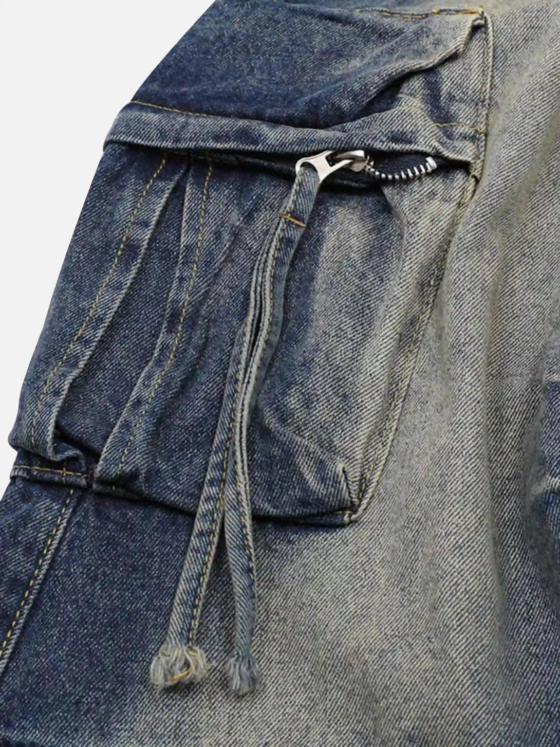 A tight crop highlighting the utility pocket design on TALISHKO cargo jeans.