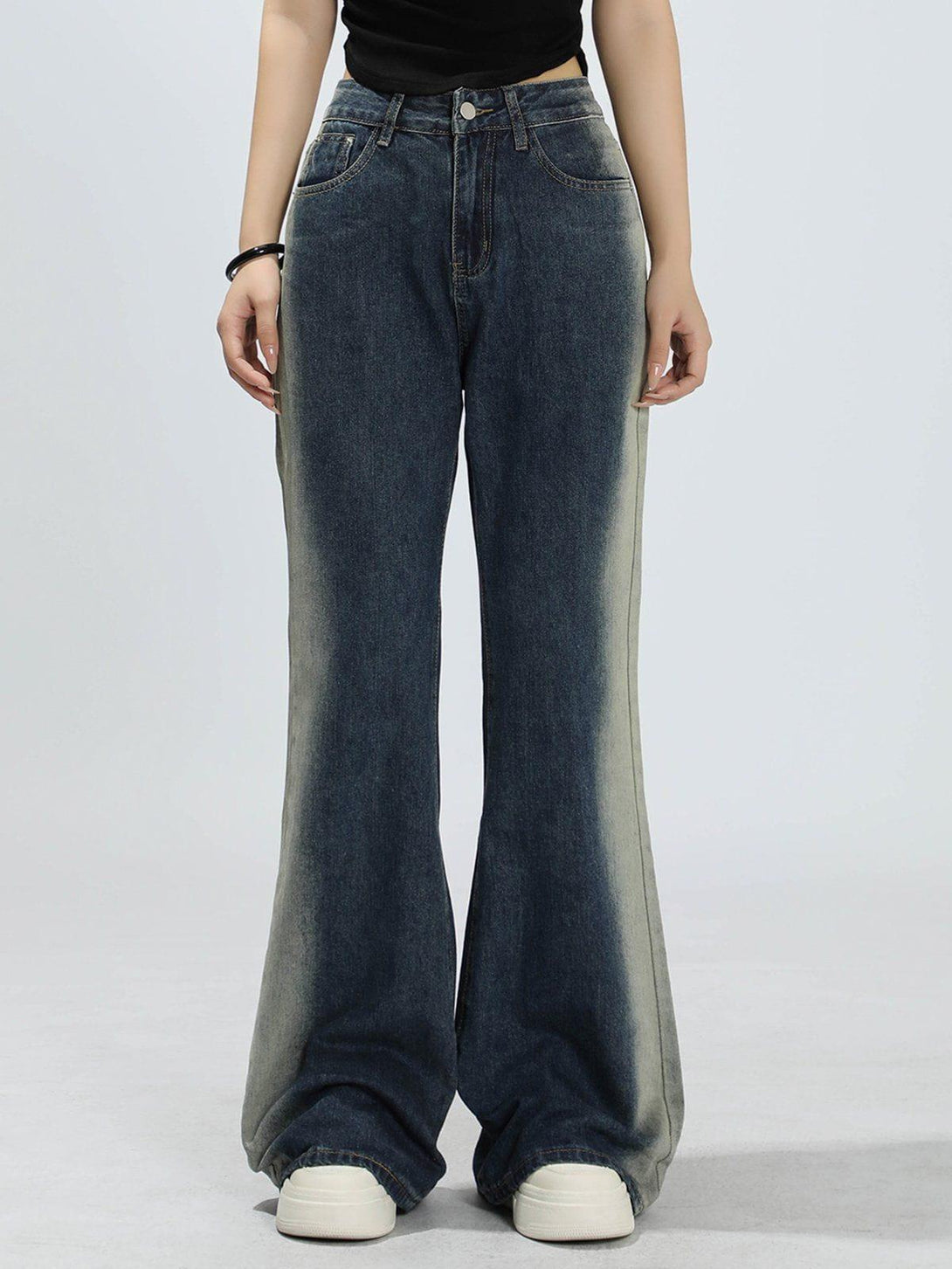 Stylish gradient patchwork jeans by TALISHKO, modeled front view with a casual flair.