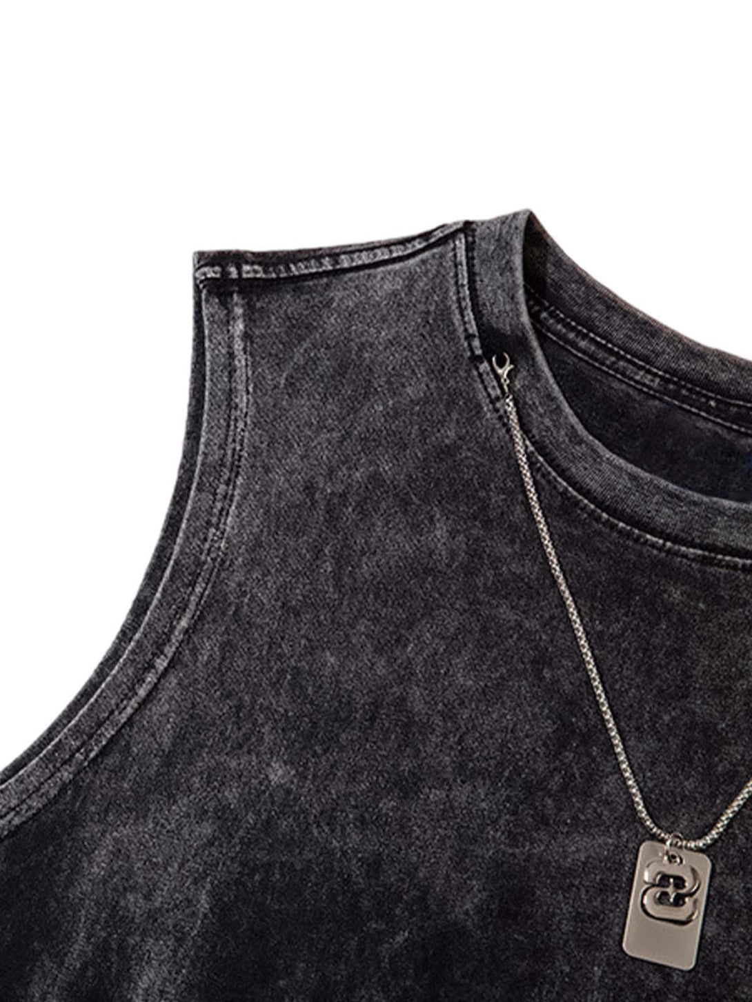 A detailed view of TALISHKO's black gradient vest, highlighting raw edges and casual charm.