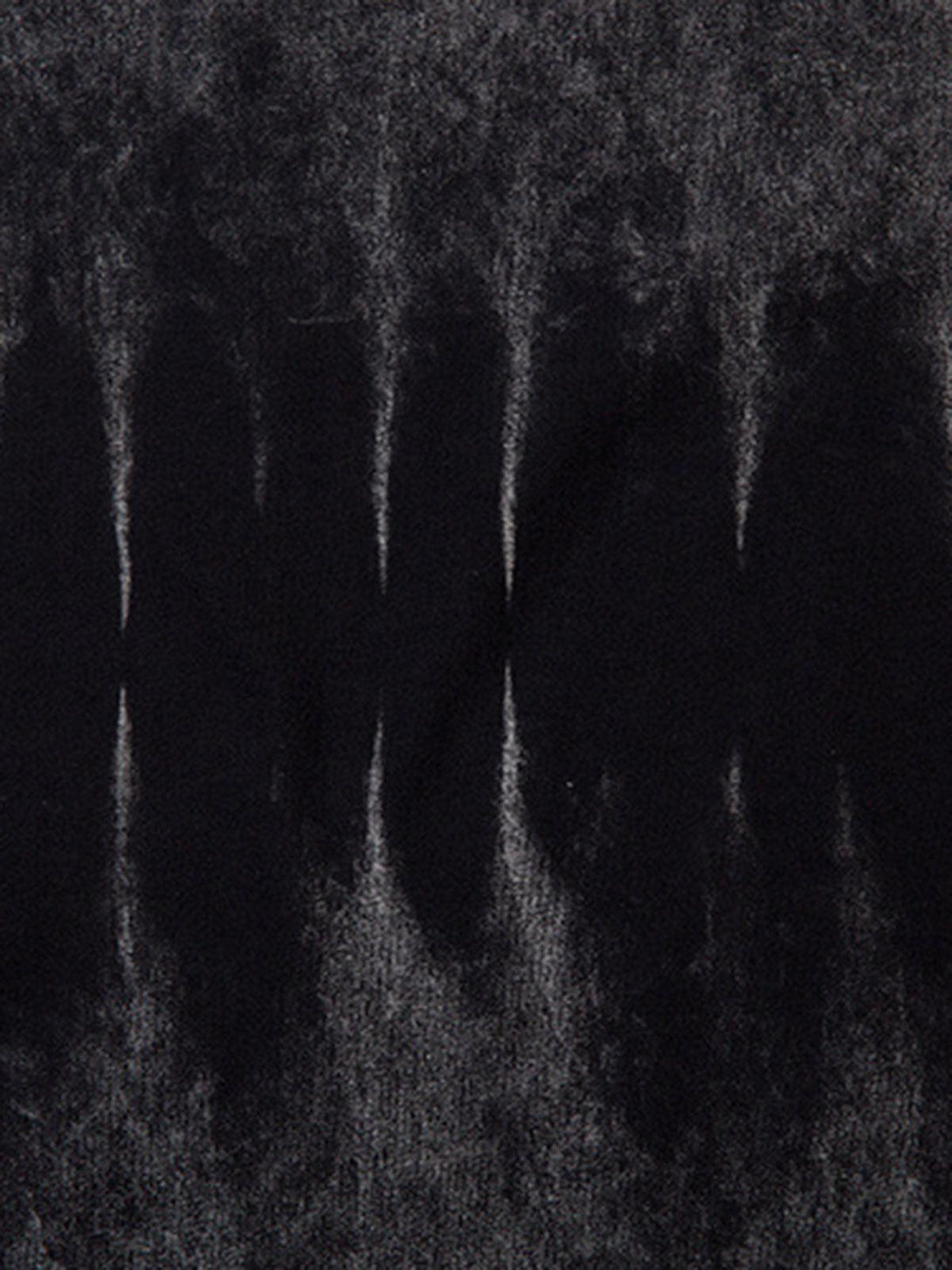 A tight crop highlighting the gradient tie-dye pattern of TALISHKO's vest with raw edges.