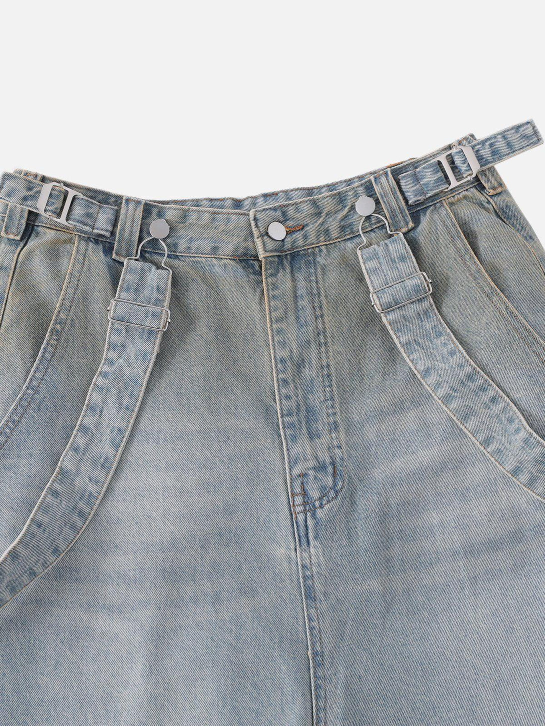 A close-up of TALISHKO's gradient washed loose jeans, highlighting unique buckle details.