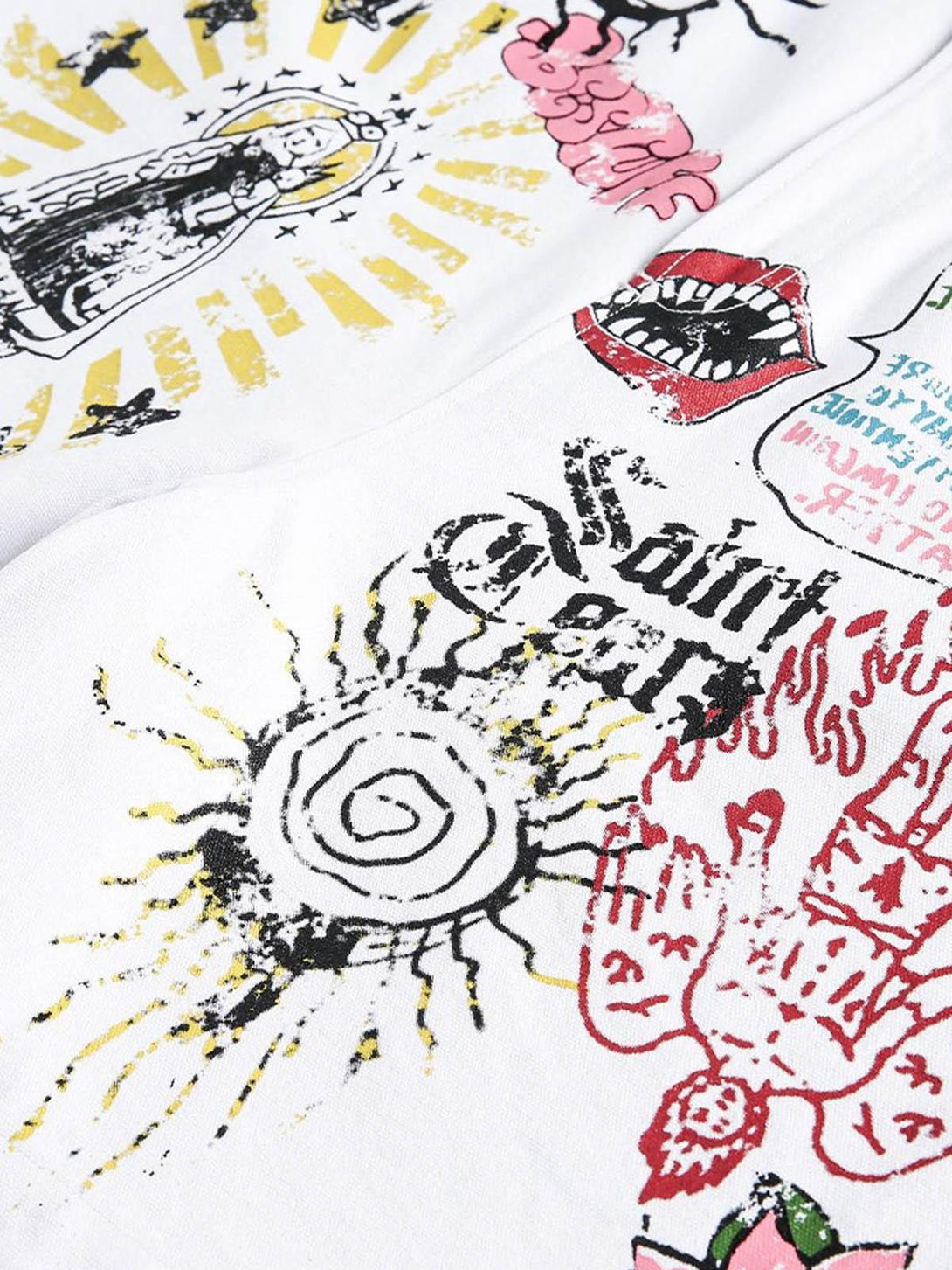 Intricate look at TALISHKO denim shorts showcasing vibrant graffiti art and eclectic patterns.