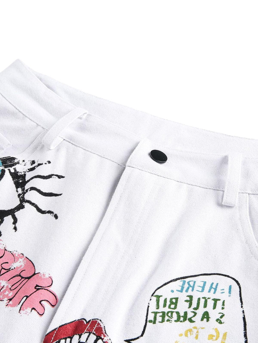 Detailed view of TALISHKO white denim shorts highlighting vibrant graffiti art and playful designs.