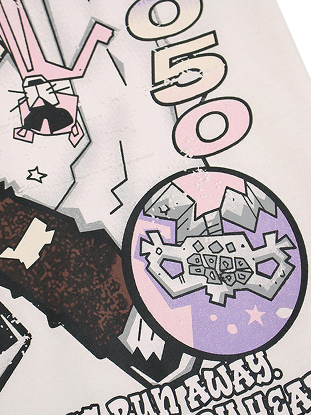 A close-up of graffiti art on a TALISHKO T-shirt, highlighting bold graphic elements.
