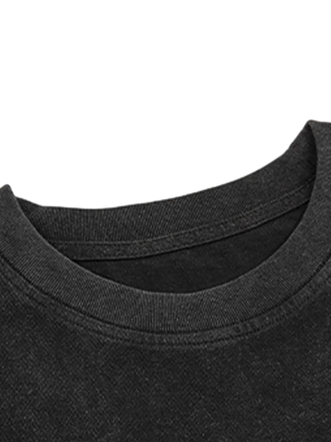 Detailed view of the neckline on a black crew neck T-shirt by TALISHKO, showcasing fabric texture.